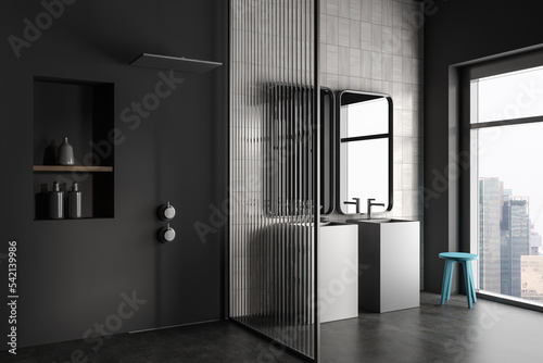 Corner view on dark bathroom interior with shower, panoramic window © ImageFlow