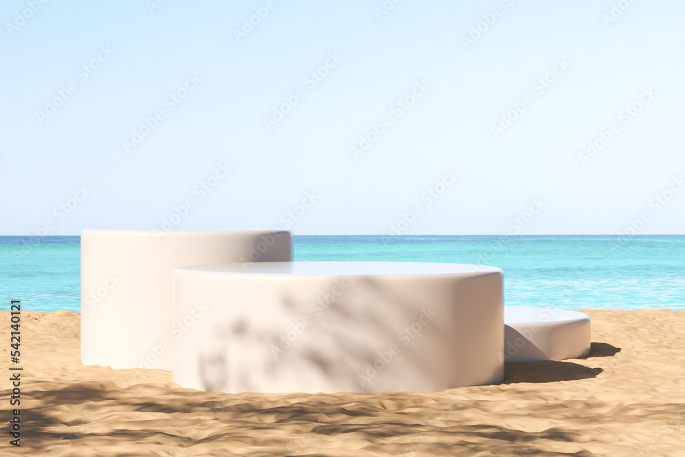 White podiums at the beach, ocean view. Mockup for product display White podiums at the beach, ocean view. Mockup for product display
