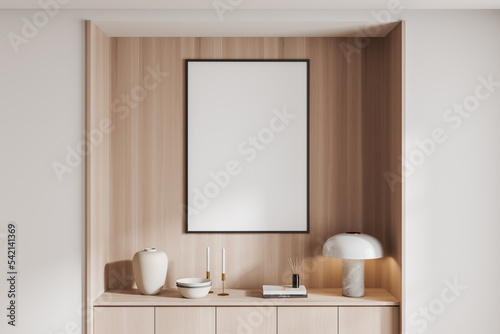 Front view on bright living room interior with empty white poster