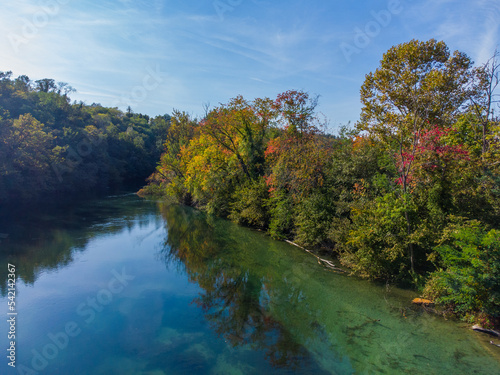 River reflecting autumn trees