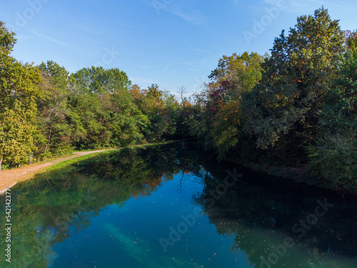 River reflecting autumn trees