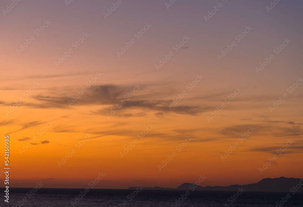 Orange sunset. Beautiful sky.
weather and nature concept. Plenty space for text. full screen
