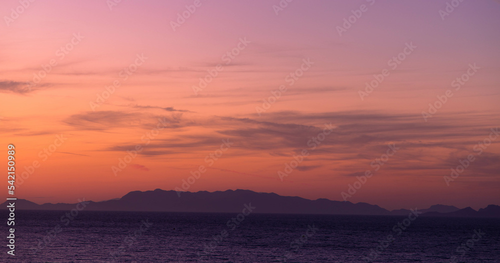 Romantic cloudy sky at sunset. Orange gradient. Sky structure, abstract nature background. copy space.