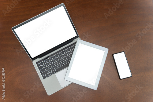 Set of gadgets. Laptop,  laptops tablets, smartphones. Programmer workplace concept. Top view. IT technologies