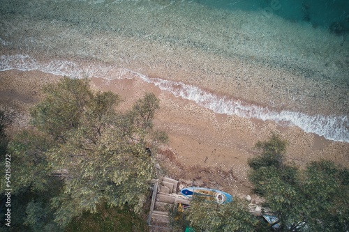 Aerial view of the peaceful Dessimi beach with trees on Lefkada photo