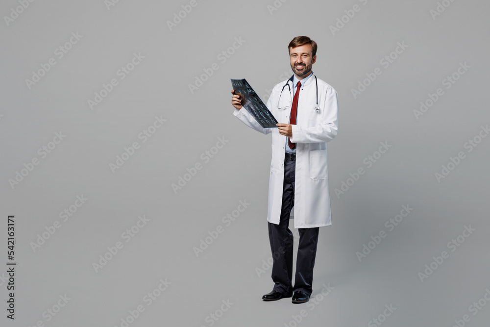 Full size male doctor man wear white medical gown suit work in hospital