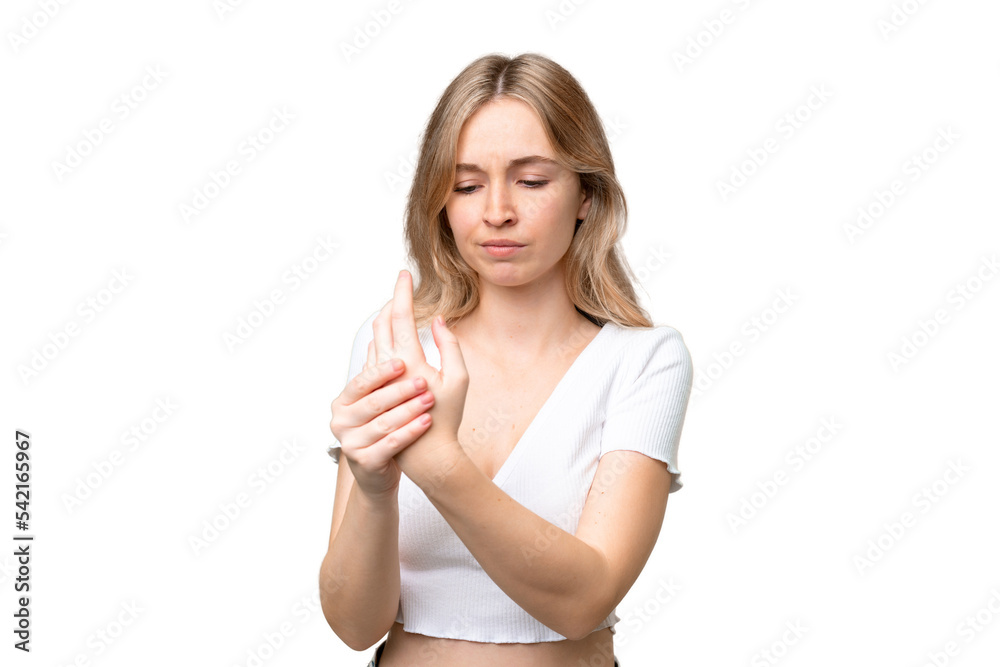 Young English woman over isolated background suffering from pain in hands Young English woman over isolated background suffering from pain in hands