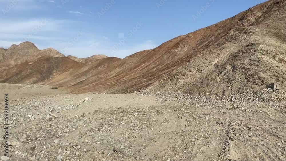 desert peruvian road with rocks view from the window, fade out in wall of mountains desert peruvian road with rocks view from the window, fade out in wall of mountains