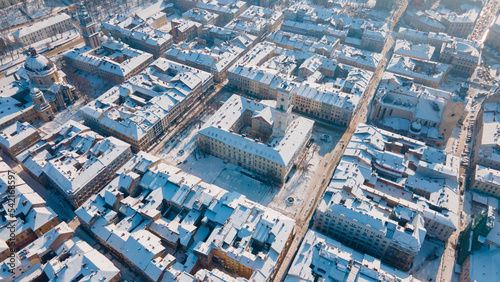 aerial view of lviv city center at snowed winter sunny day photo