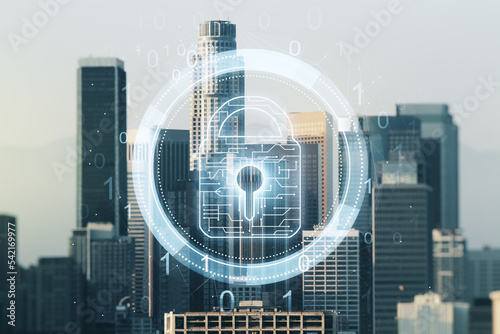 Double exposure of virtual creative lock hologram with chip on Los Angeles city skyscrapers background. Information security concept