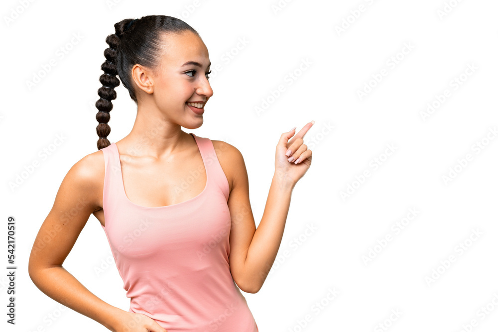 Young Arab woman over isolated background pointing finger to the side and presenting a product Young Arab woman over isolated background pointing finger to the side and presenting a product