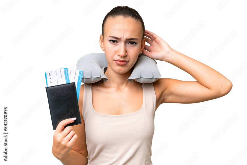 Young Arab woman with Inflatable Travel Pillow over isolated background having doubts Young Arab woman with Inflatable Travel Pillow over isolated background having doubts