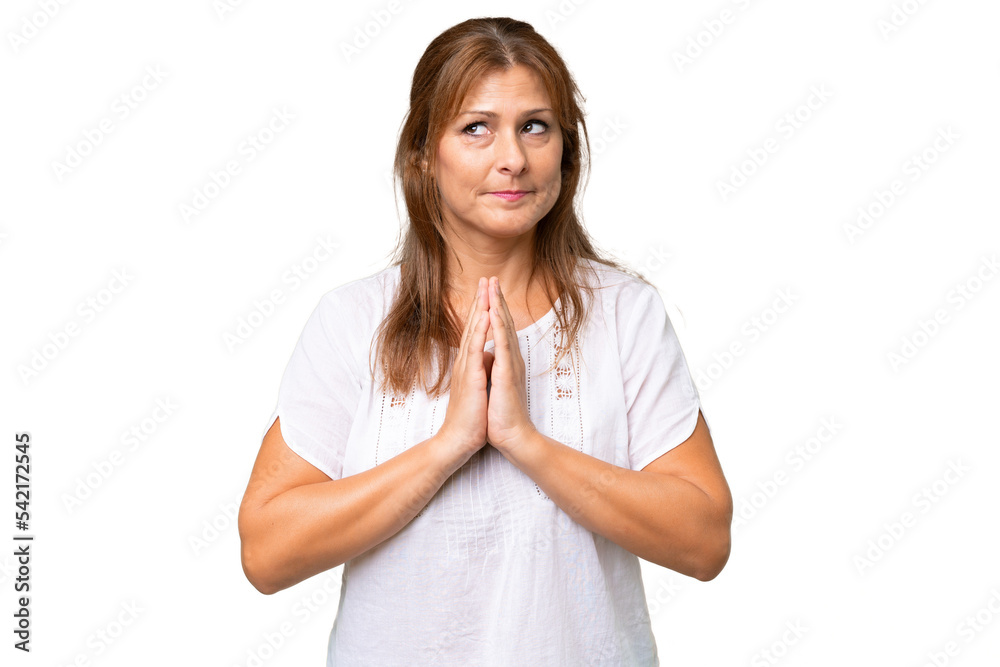 Middle-aged caucasian woman over isolated background scheming something Middle-aged caucasian woman over isolated background scheming something