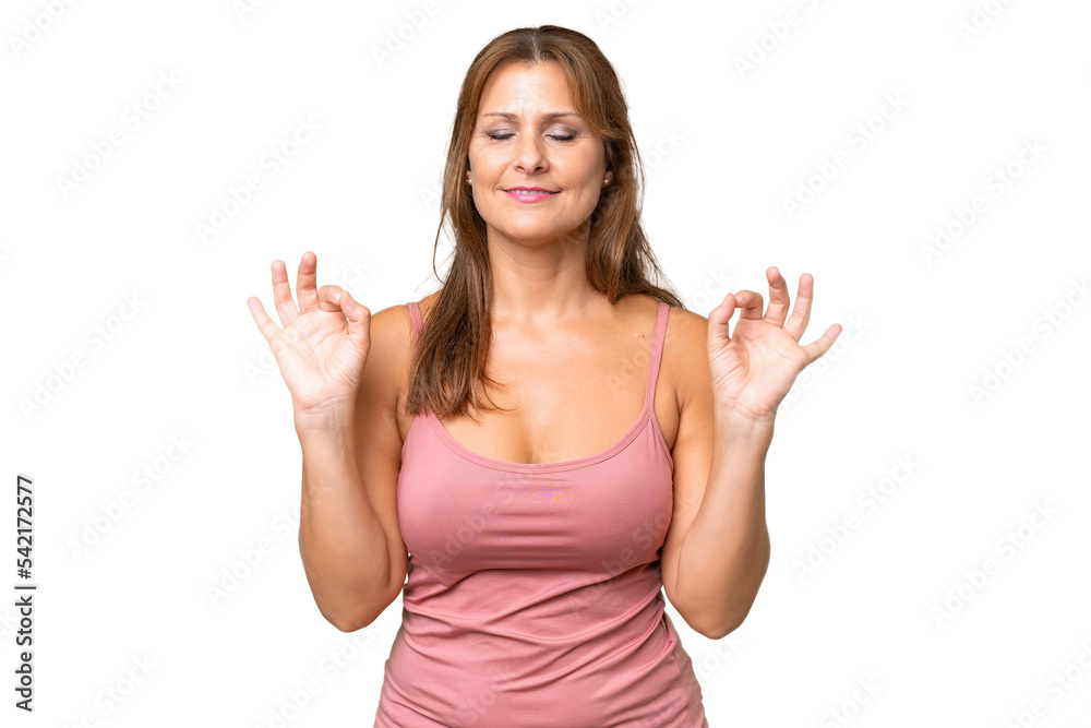 Middle-aged caucasian woman over isolated background in zen pose Middle-aged caucasian woman over isolated background in zen pose
