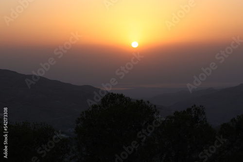 beautiful sky at sunset from valley in front of dead sea