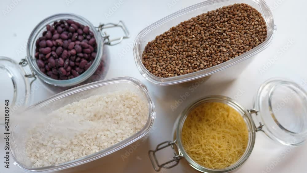 Eco-friendly containers for storing cereals. Eco-friendly house and safe storage of products. Organization of space. Rice. Eco-friendly containers for storing cereals. Eco-friendly house and safe storage of products. Organization of space. Rice.