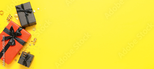 Gift boxes on yellow backgr...