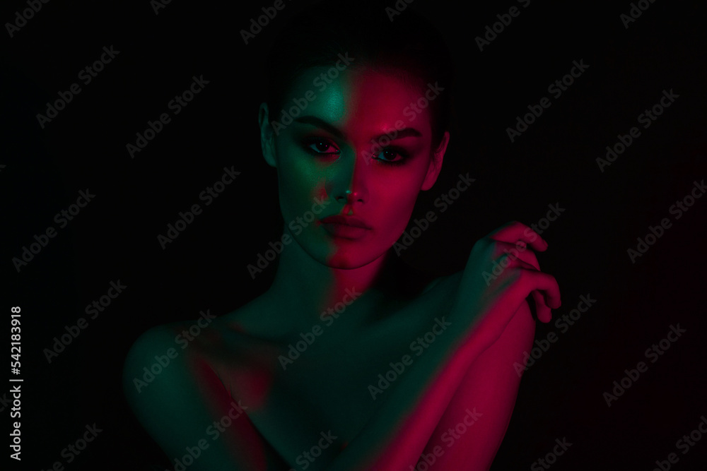 Woman on green pink neon background. Woman on green pink neon background.