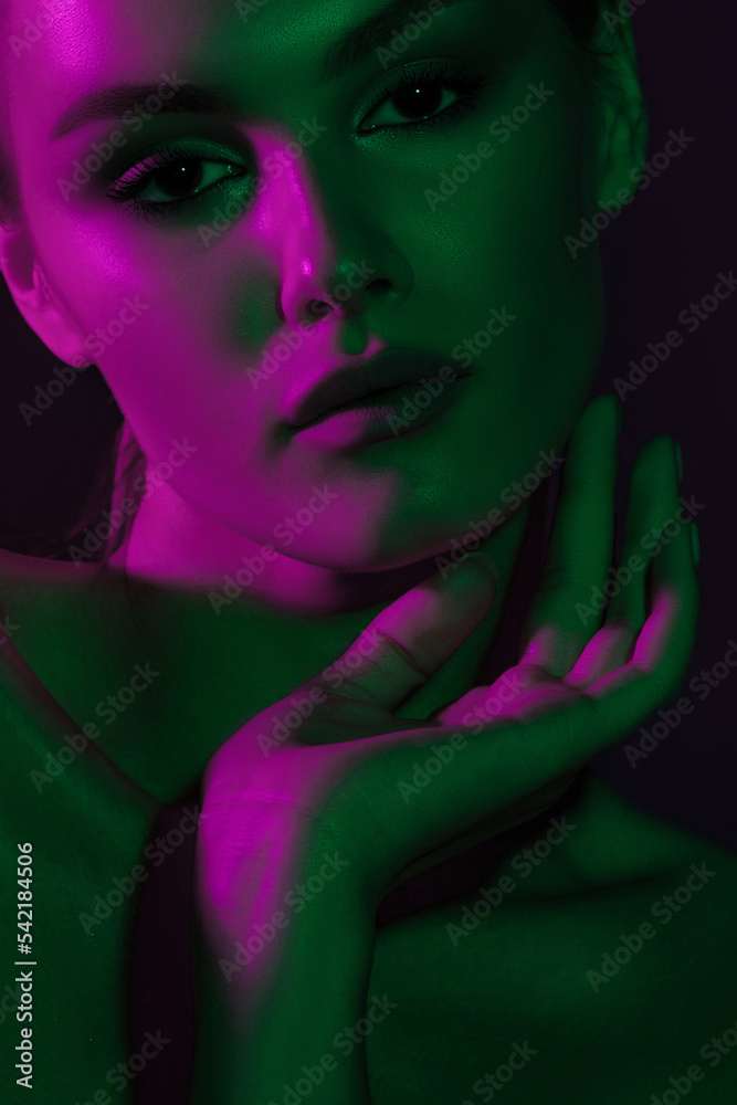 Woman on pink blue neon background. Woman on pink blue neon background.