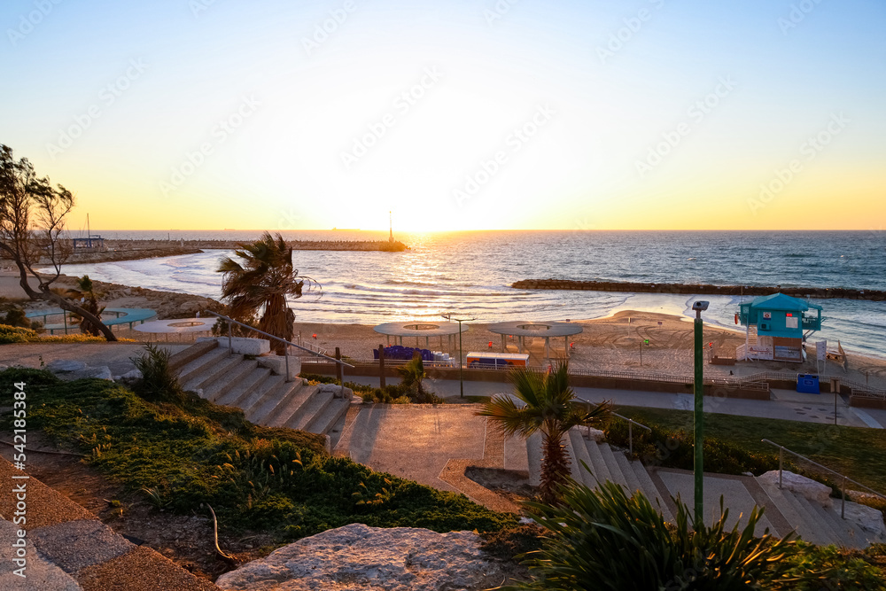 View of stairs and beautiful sea at sunset