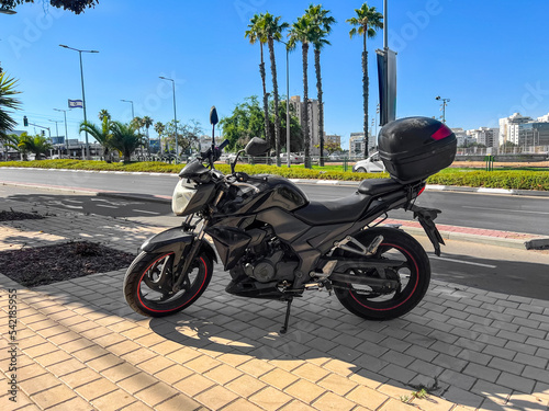 Modern motorcycle parked on...