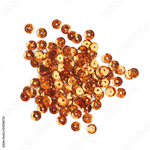 Pile of orange sequins isolated on white, top view