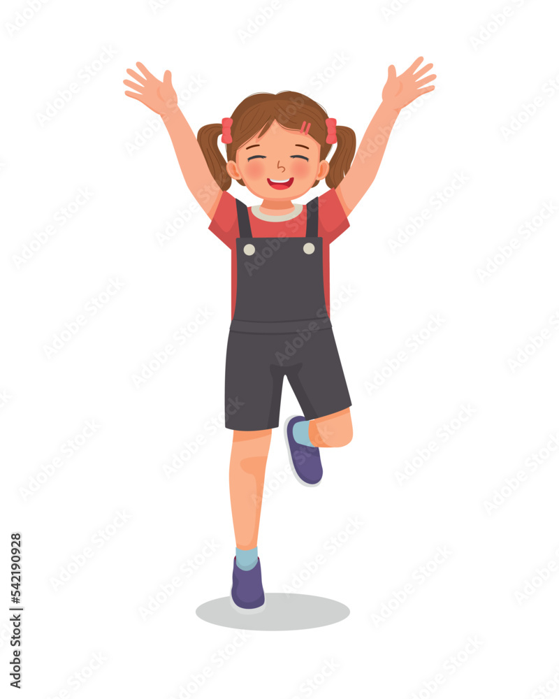 cute little girl get excited jumping with both hands raise up feeling happy