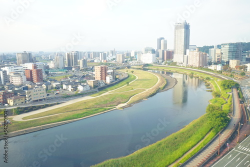 Obraz na płótnie City View of Kumamoto and Shirakawa River in Kumamoto, Japan - 日本 熊本県 街並み 白川 w salonie