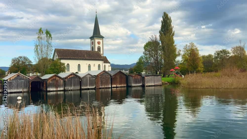 Beautiful scenery along the small harbor of the idyllic lakeside village of Busskirch, Rapperswil-Jona, St. Galen, Switzerland
Beautiful scenery along the small harbor of the idyllic lakeside village of Busskirch, Rapperswil-Jona, St. Galen, Switzerland