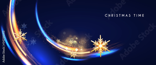 Merry Christmas shining celeration with motion light and gold snowflakes. photo