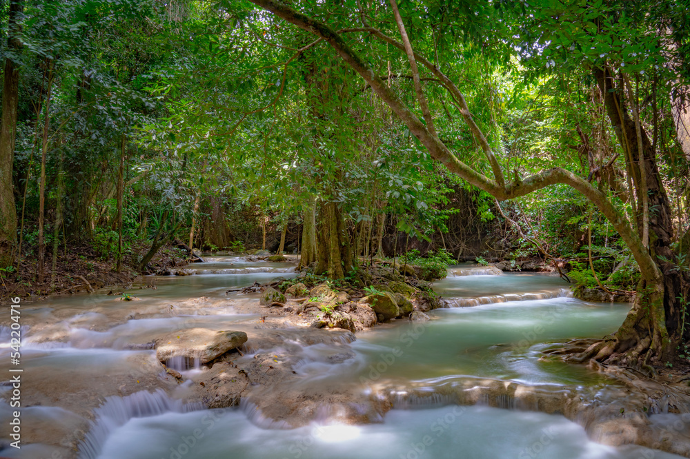 Beautiful waterfall in the forest at Erawan waterfall National Park, Thailand