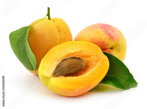 Apricots with leaves.