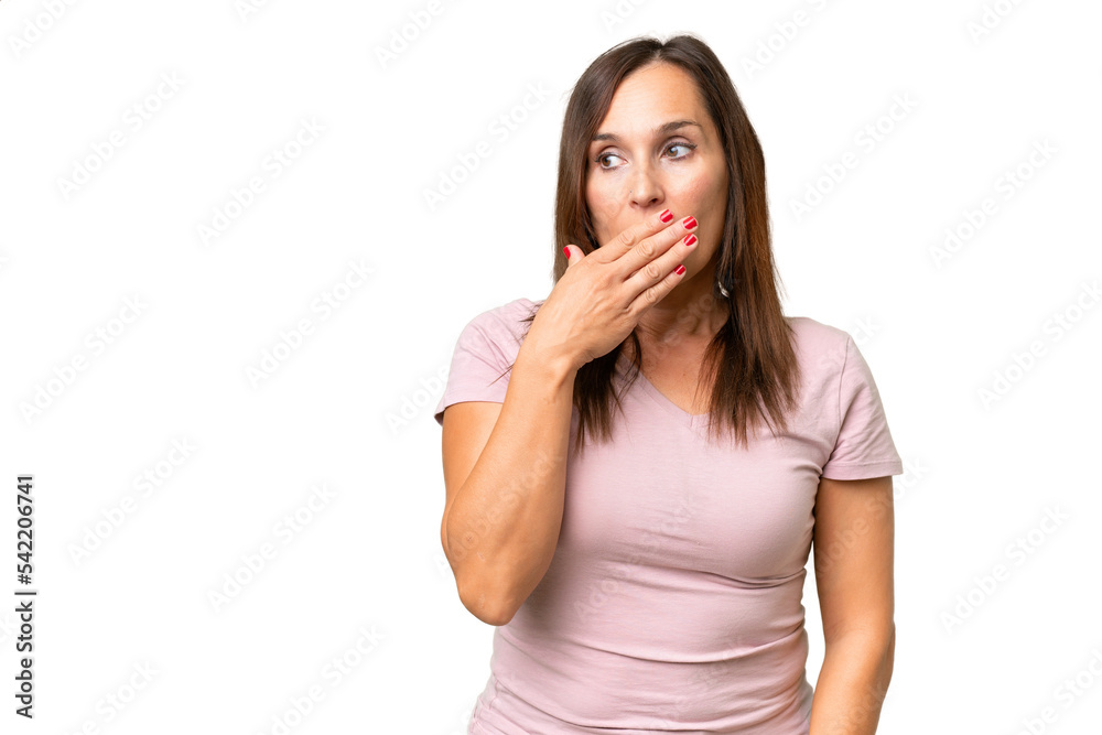 Middle-aged caucasian woman over isolated background doing surprise gesture while looking to the side Middle-aged caucasian woman over isolated background doing surprise gesture while looking to the side