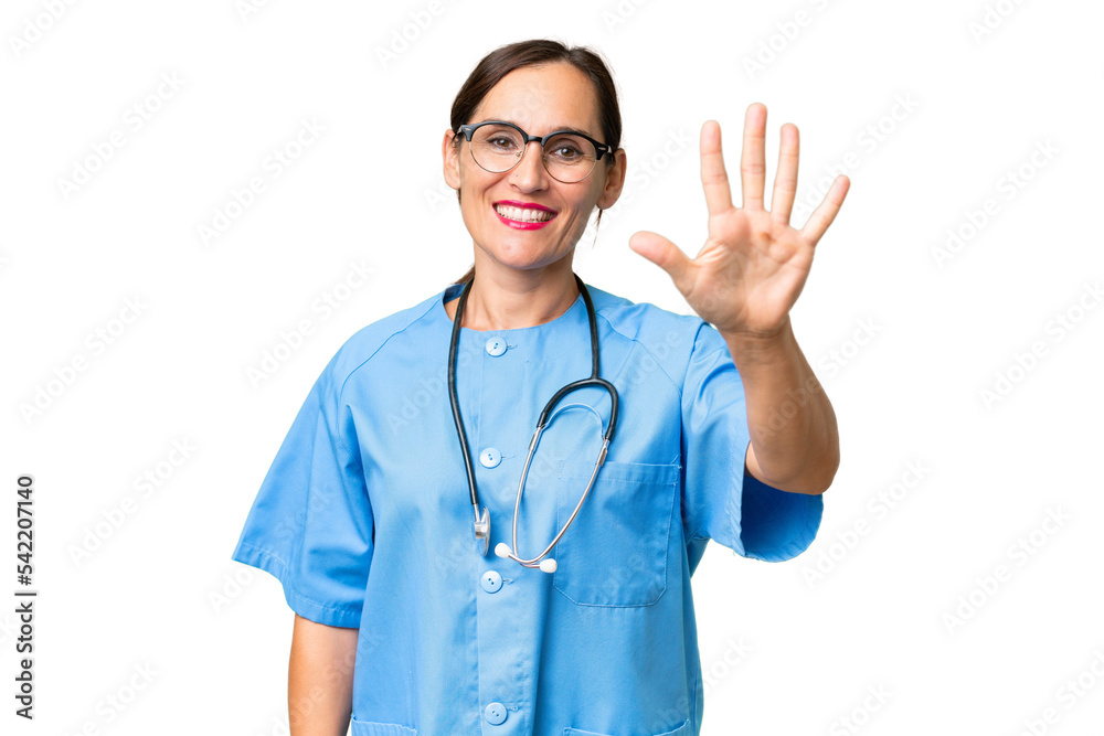 Middle-aged nurse woman over isolated background counting five with fingers Middle-aged nurse woman over isolated background counting five with fingers