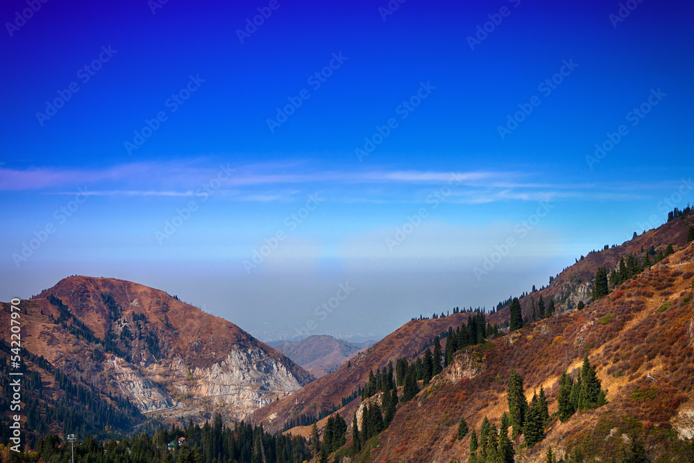Beautiful mountain landscape against the blue sky in summer weather.