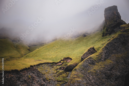 valley fog amid volcanic terrain, Iceland