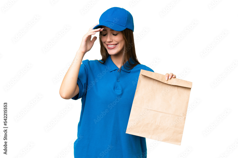 Young beautiful caucasian woman taking a bag of takeaway food over isolated background laughing Young beautiful caucasian woman taking a bag of takeaway food over isolated background laughing
