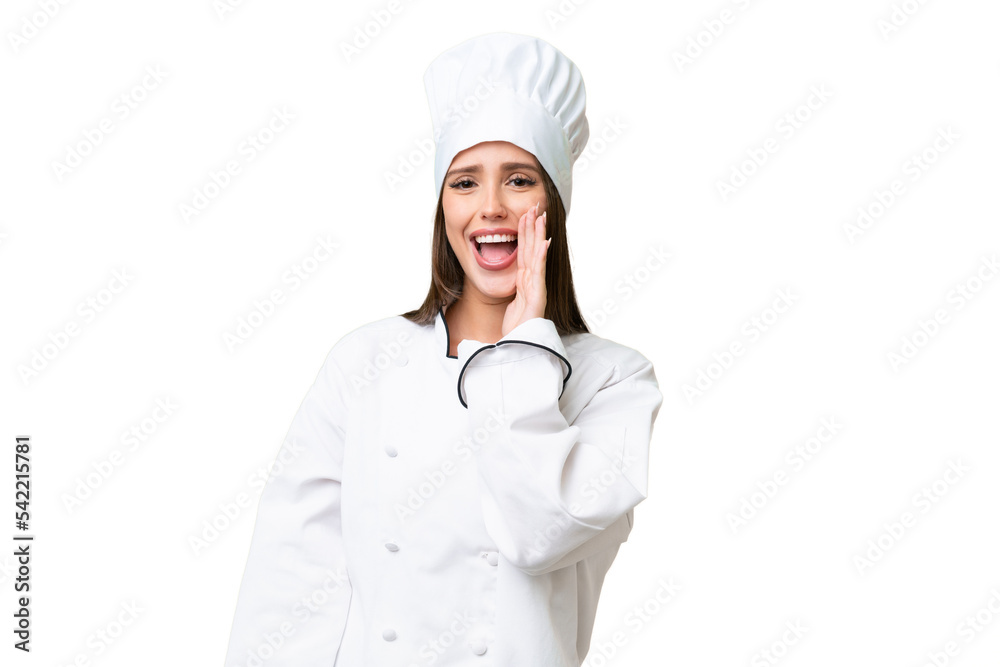 Young chef caucasian woman over isolated background shouting with mouth wide open
