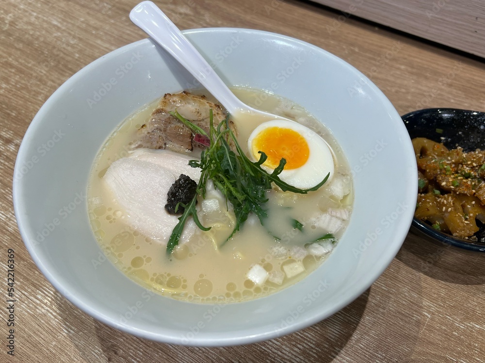 Black Truffle Ramen,combination of black truffle and pork chintan soup, served with crafted fresh thin noodles, silky chicken chashu, torched pork-belly chashu, egg, wild rocket, and red onion Black Truffle Ramen,combination of black truffle and pork chintan soup, served with crafted fresh thin noodles, silky chicken chashu, torched pork-belly chashu, egg, wild rocket, and red onion