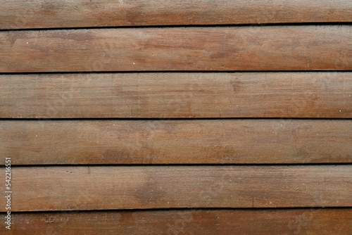 Old brown plank, rough texture, abstract background.