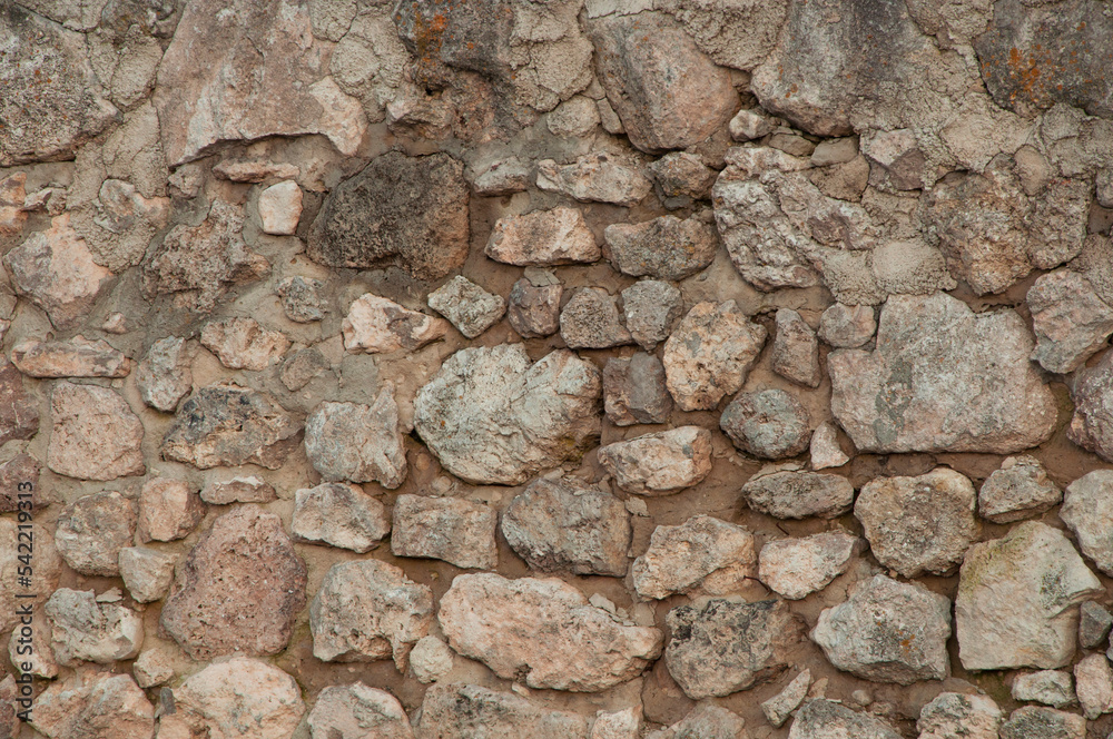 stone background. creative gray texture. colored mosaic. wall made of slabs. brick wall in loft style