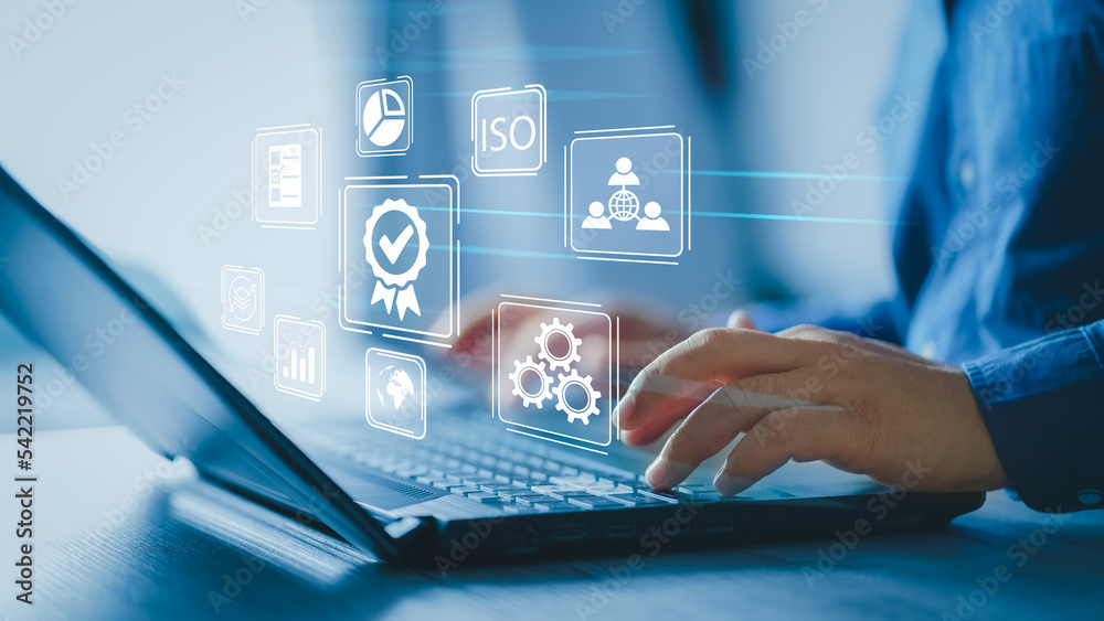 Obraz premium Quality management with QA (assurance), QC (control) and improvement. Businessman working on laptops with signs of the top service Quality control certification checked guarantees of the standard.