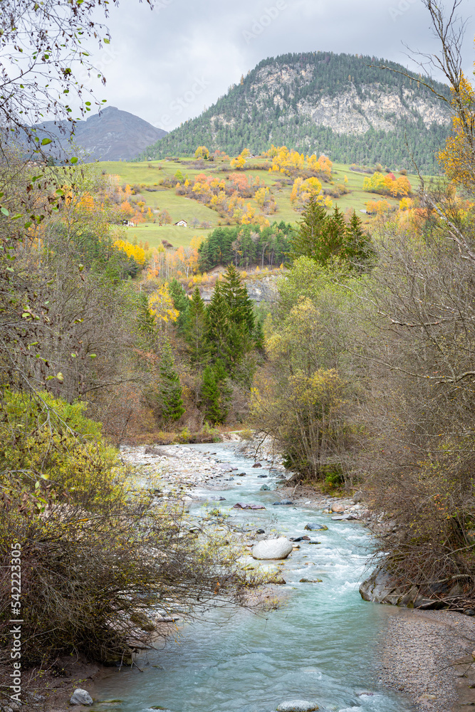 Scenic autumn view of a babbling brook in the Swiss Alps near Filisur in the canton of Graubünden, Switzerland Scenic autumn view of a babbling brook in the Swiss Alps near Filisur in the canton of Graubünden, Switzerland