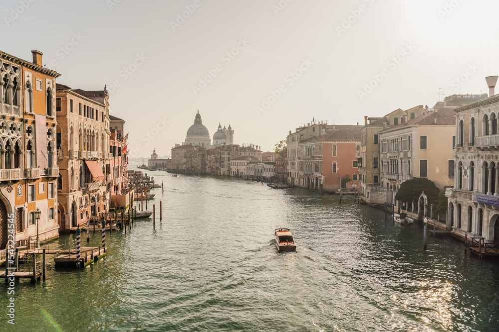 iconic view of the grand canal and church of Santa Maria della Salute in the background in Venice, Italy