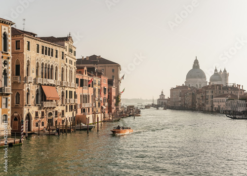 beautiful view of the grand canal and church of Santa Maria della Salute in Venice, Italy  © gammaphotostudio