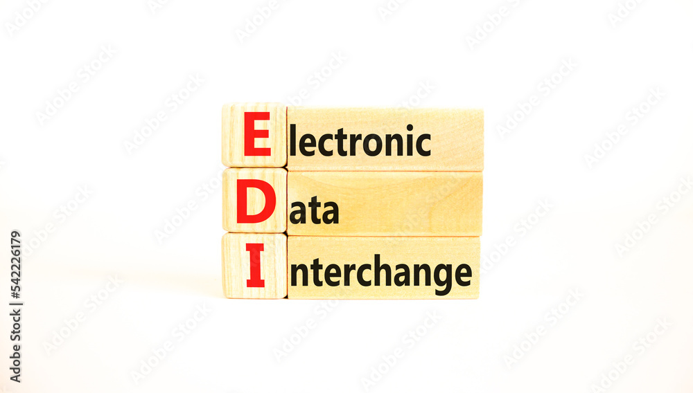 EDI electronic data interchange symbol. Concept words EDI electronic data interchange on wooden blocks on a beautiful white background. Business and EDI electronic data interchange concept. Copy space EDI electronic data interchange symbol. Concept words EDI electronic data interchange on wooden blocks on a beautiful white background. Business and EDI electronic data interchange concept. Copy space