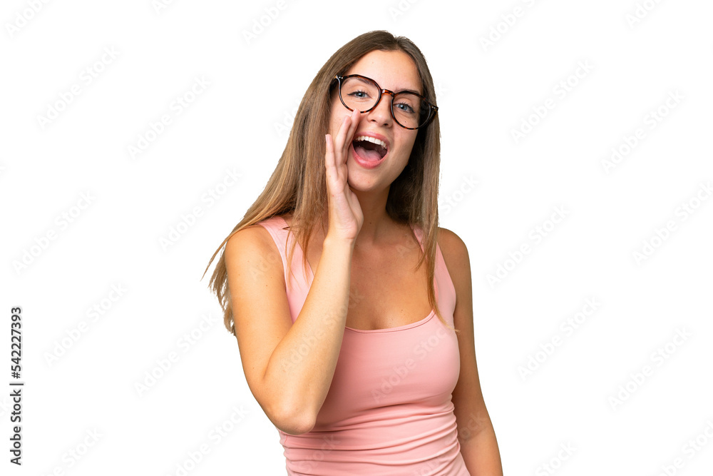 Young pretty woman over isolated background shouting with mouth wide open Young pretty woman over isolated background shouting with mouth wide open