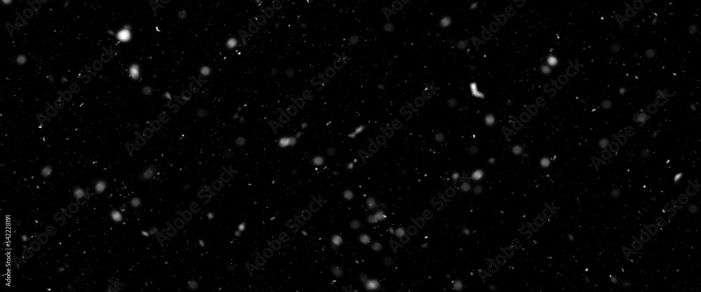 Falling snow isolated on black background. Falling snow at night. Bokeh lights on black background, flying snowflakes in the air. Winter weather. Overlay texture.	
