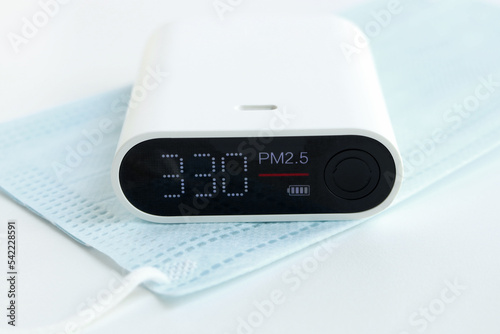 Air Quality Meter on Surgical Face Mask Air Pollution Concept Abstract