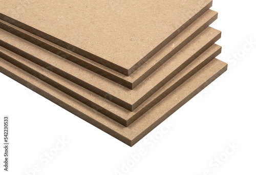Multiple boards of raw mdf lined up without any order.